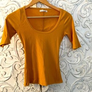 Reformation Delia ribbed top in Mustard yellow